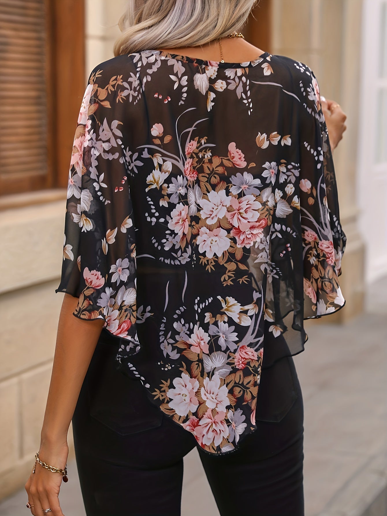 Schwarze Bluse mit Blumenprint und asymmetrischem Design - Noor