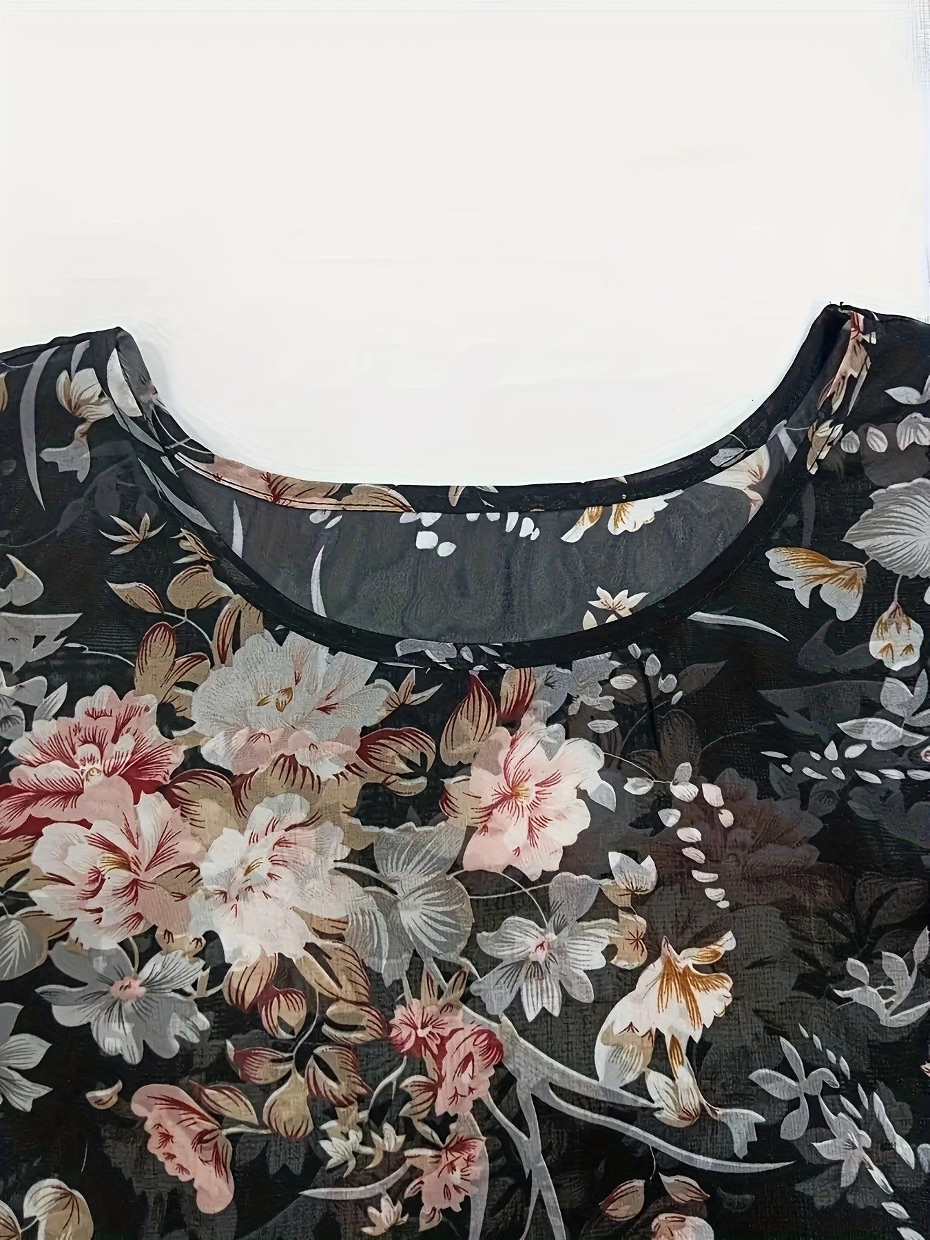 Schwarze Bluse mit Blumenprint und asymmetrischem Design - Noor