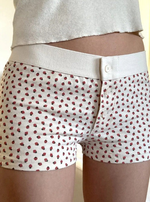 Weiße Shorts mit Knopfleiste und Erdbeer-Print