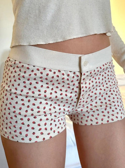 Weiße Shorts mit Knopfleiste und Erdbeer-Print