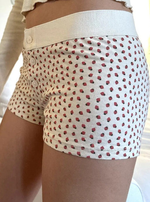 Weiße Shorts mit Knopfleiste und Erdbeer-Print