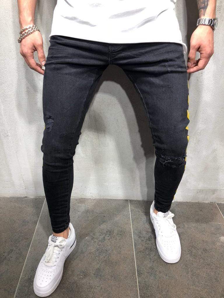 Schwarze Jeans mit gelben Streifen - Noah